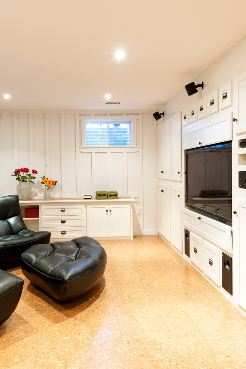 Finished basement with family room and recessed lighting